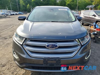 Piąte zdjęcie samochodu w środku: 2016 FORD EDGE TITANIUM VIN:2FMPK4K96GBC23918 - miniatura