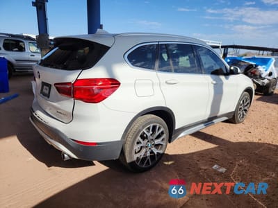 Trzecie zdjęcie samochodu z tyłu: 2021 BMW X1 SDRIVE28I VIN:WBXJG7C09M5U09209 - miniatura