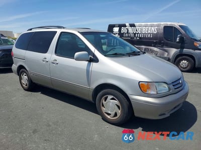 Czwarte zdjęcie samochodu z boku: 2003 TOYOTA SIENNA XLE VIN:4T3ZF13CX3U520496 - miniatura