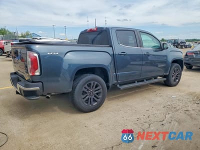Trzecie zdjęcie samochodu z tyłu: 2020 GMC CANYON SLE VIN:1GTG6CEN6L1119334 - miniatura