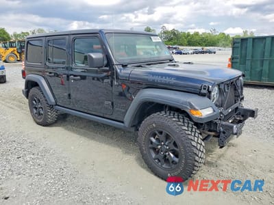 Czwarte zdjęcie samochodu z boku: 2020 JEEP WRANGLER UNLIMITED SPORT VIN:1C4HJXDG7LW179204 - miniatura