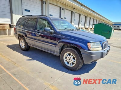 Czwarte zdjęcie samochodu z boku: 2004 JEEP GRAND CHEROKEE LAREDO VIN:1J4GX48NX4C435382 - miniatura