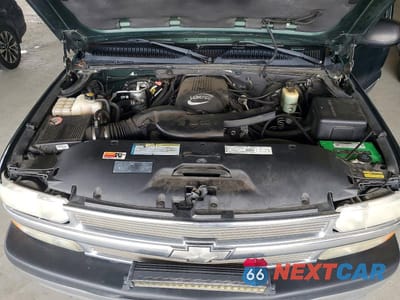 Zdjęcie 12 z 13 samochodu: 2001 CHEVROLET TAHOE K1500 VIN:1GNEK13T41J205223 - miniatura