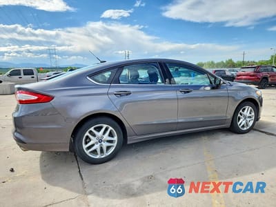 Trzecie zdjęcie samochodu z tyłu: 2014 FORD FUSION SE VIN:3FA6P0HDXER157688 - miniatura