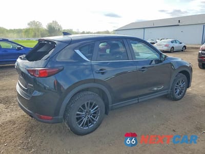 Trzecie zdjęcie samochodu z tyłu: 2021 MAZDA CX-5 TOURING VIN:JM3KFBCMXM1406344 - miniatura