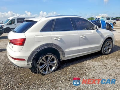 Trzecie zdjęcie samochodu z tyłu: 2016 AUDI Q3 PREMIUM PLUS VIN:WA1EFCFS0GR010915 - miniatura
