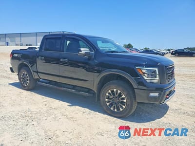 Czwarte zdjęcie samochodu z boku: 2024 NISSAN TITAN PRO-4X VIN:1N6AA1ED5RN111045 - miniatura
