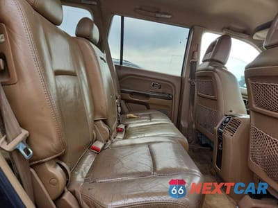 Zdjęcie 11 z 13 samochodu: 2004 HONDA PILOT EXL VIN:2HKYF18614H505070 - miniatura