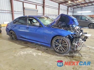 Czwarte zdjęcie samochodu z boku: 2020 BMW M340I VIN:3MW5U7J03L8B45817 - miniatura