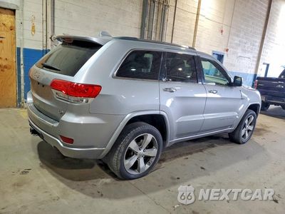 Trzecie zdjęcie samochodu z tyłu: 2014 JEEP GRAND CHEROKEE OVERLAND VIN:1C4RJFCG1EC221063 - miniatura