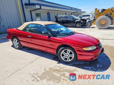 Czwarte zdjęcie samochodu z boku: 2000 CHRYSLER SEBRING JX VIN:3C3EL45H3YT260947 - miniatura