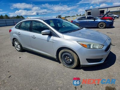 Czwarte zdjęcie samochodu z boku: 2015 FORD FOCUS SE VIN:1FADP3F20FL233865 - miniatura
