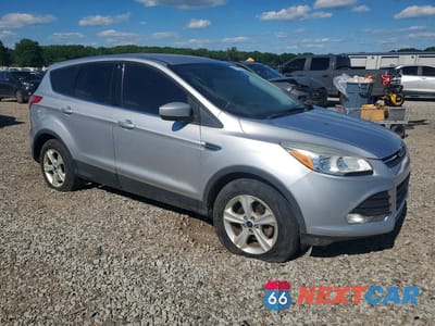 Czwarte zdjęcie samochodu z boku: 2016 FORD ESCAPE SE VIN:1FMCU0G76GUB71340 - miniatura