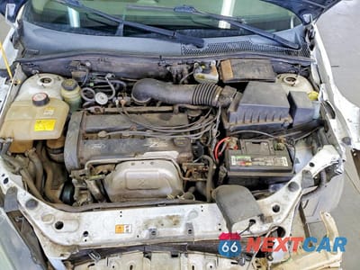 Zdjęcie 11 z 13 samochodu: 2004 FORD FOCUS SE COMFORT VIN:1FAHP34364W178105 - miniatura