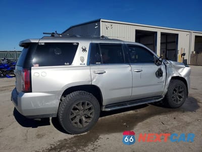 Trzecie zdjęcie samochodu z tyłu: 2016 GMC YUKON SLE VIN:1GKS1AKC5GR384354 - miniatura