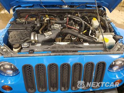 Zdjęcie 12 z 13 samochodu: 2011 JEEP WRANGLER UNLIMITED SAHARA VIN:1J4BA5H16BL600159 - miniatura