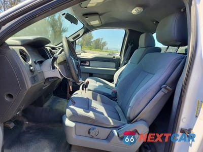 Zdjęcie 7 z 12 samochodu: 2014 FORD F150 VIN:1FTNF1CFXEKD64500 - miniatura