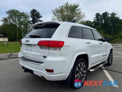 Czwarte zdjęcie samochodu z boku: 2018 JEEP GRAND CHEROKEE OVERLAND VIN:1C4RJFCT6JC104487 - miniatura