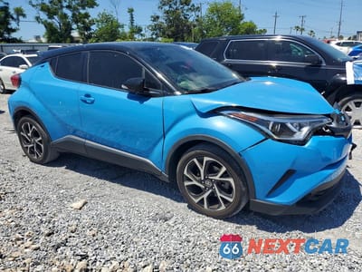 Czwarte zdjęcie samochodu z boku: 2019 TOYOTA C-HR XLE VIN:JTNKHMBX8K1061284 - miniatura