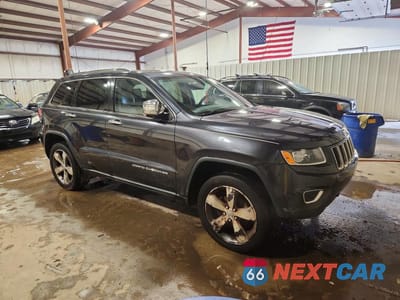 Czwarte zdjęcie samochodu z boku: 2014 JEEP GRAND CHEROKEE LIMITED VIN:1C4RJFBG0EC288772 - miniatura