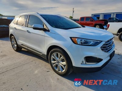 Czwarte zdjęcie samochodu z boku: 2020 FORD EDGE TITANIUM VIN:2FMPK3K91LBB19342 - miniatura