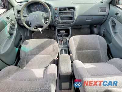 Zdjęcie 8 z 12 samochodu: 1999 HONDA CIVIC LX VIN:1HGEJ6678XL020579 - miniatura