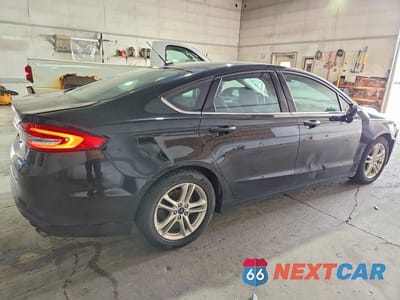 Trzecie zdjęcie samochodu z tyłu: 2018 FORD FUSION SE VIN:3FA6P0HDXJR275170 - miniatura