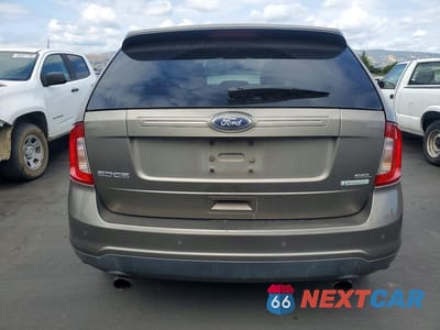 Zdjęcie 6 z 13 samochodu: 2014 FORD EDGE SEL VIN:2FMDK3J95EBA11006 - miniatura