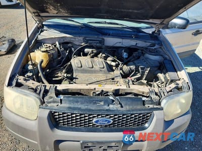 Zdjęcie 11 z 12 samochodu: 2001 FORD ESCAPE XLS VIN:1FMYU02171KA68598 - miniatura