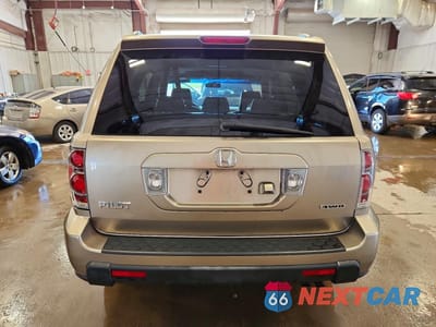 Zdjęcie 6 z 13 samochodu: 2006 HONDA PILOT EX VIN:2HKYF18716H557620 - miniatura