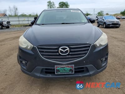 Piąte zdjęcie samochodu w środku: 2016 MAZDA CX-5 TOURING VIN:JM3KE4CYXG0617653 - miniatura