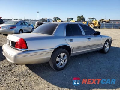 Trzecie zdjęcie samochodu z tyłu: 2011 FORD CROWN VICTORIA LX VIN:2FABP7EV8BX127154 - miniatura