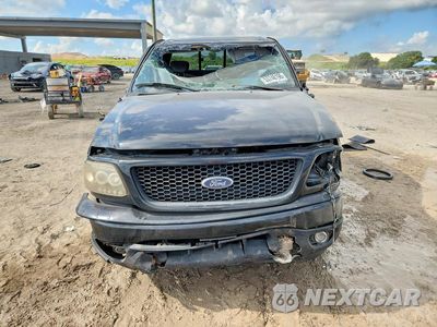 Piąte zdjęcie samochodu w środku: 2001 FORD F150 VIN:1FTRX18WX1NA89422 - miniatura