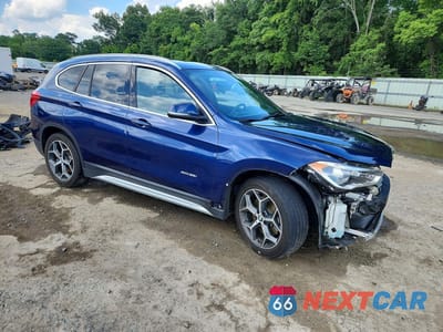Czwarte zdjęcie samochodu z boku: 2016 BMW X1 XDRIVE28I VIN:WBXHT3C33GP880665 - miniatura