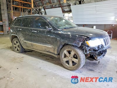 Czwarte zdjęcie samochodu z boku: 2012 JEEP GRAND CHEROKEE LIMITED VIN:1C4RJFBG8CC127597 - miniatura