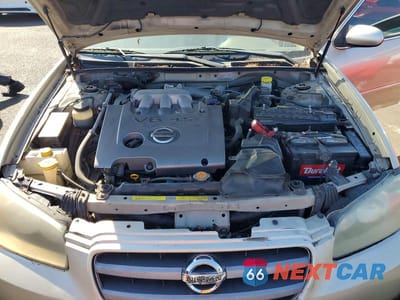 Zdjęcie 11 z 12 samochodu: 2002 NISSAN MAXIMA GXE VIN:JN1DA31D12T451914 - miniatura