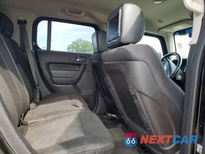 Zdjęcie 11 z 13 samochodu: 2007 HUMMER H3 VIN:5GTDN13E778227612 - miniatura