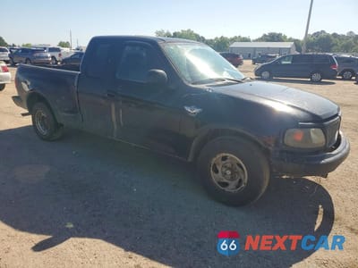 Czwarte zdjęcie samochodu z boku: 2003 FORD F150 VIN:1FTRX07253KC11407 - miniatura