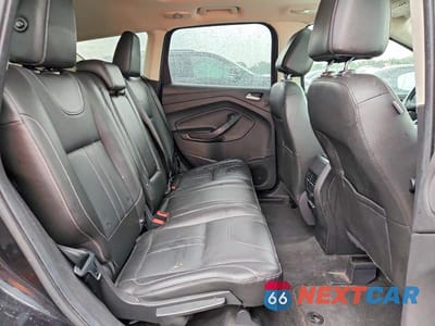 Zdjęcie 11 z 13 samochodu: 2013 FORD ESCAPE TITANIUM VIN:1FMCU9J97DUD50156 - miniatura