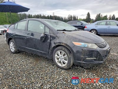 Czwarte zdjęcie samochodu z boku: 2010 HONDA INSIGHT EX VIN:JHMZE2H79AS023853 - miniatura