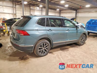 Trzecie zdjęcie samochodu z tyłu: 2021 VOLKSWAGEN TIGUAN SE VIN:3VV3B7AX7MM060048 - miniatura