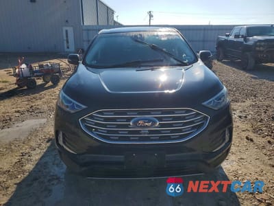 Piąte zdjęcie samochodu w środku: 2020 FORD EDGE TITANIUM VIN:2FMPK3K98LBA77266 - miniatura