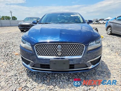 Piąte zdjęcie samochodu w środku: 2017 LINCOLN MKZ RESERVE VIN:3LN6L5E95HR648737 - miniatura