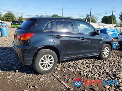 Trzecie zdjęcie samochodu z tyłu: 2011 MITSUBISHI OUTLANDER SPORT ES VIN:JA4AP3AU8BZ007709 - miniatura