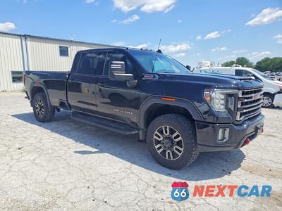 Czwarte zdjęcie samochodu z boku: 2020 GMC SIERRA K2500 AT4 VIN:1GT19PEY4LF294117 - miniatura