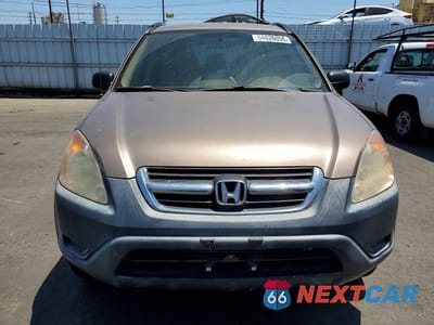 Piąte zdjęcie samochodu w środku: 2004 HONDA CR-V LX VIN:JHLRD68404C021928 - miniatura