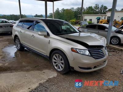 Czwarte zdjęcie samochodu z boku: 2017 LINCOLN MKT VIN:2LMHJ5FK1HBL00680 - miniatura