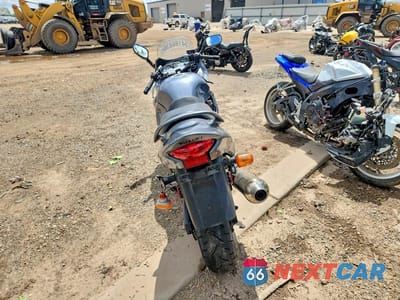Czwarte zdjęcie samochodu z boku: 2003 SUZUKI GSX750 F VIN:JS1GR7GA332100608 - miniatura
