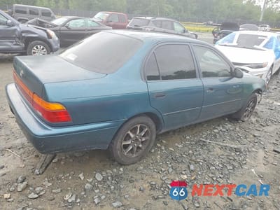Trzecie zdjęcie samochodu z tyłu: 1994 TOYOTA COROLLA DX VIN:2T1AE09B1RC068580 - miniatura