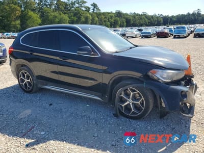 Czwarte zdjęcie samochodu z boku: 2017 BMW X1 SDRIVE28I VIN:WBXHU7C39H5H35795 - miniatura